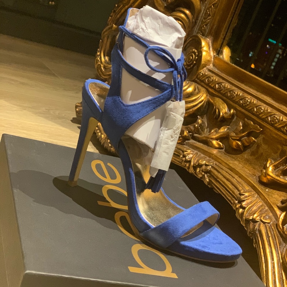 Bebe high heel sandal.